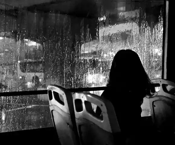 Faceless women in a bus
