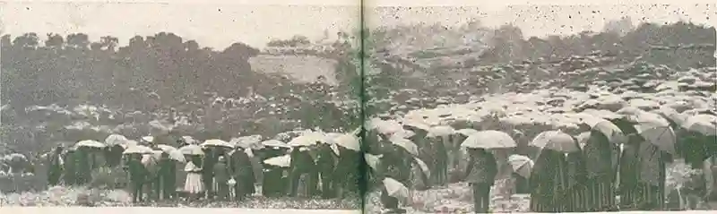 People with umbrellas in Fatima