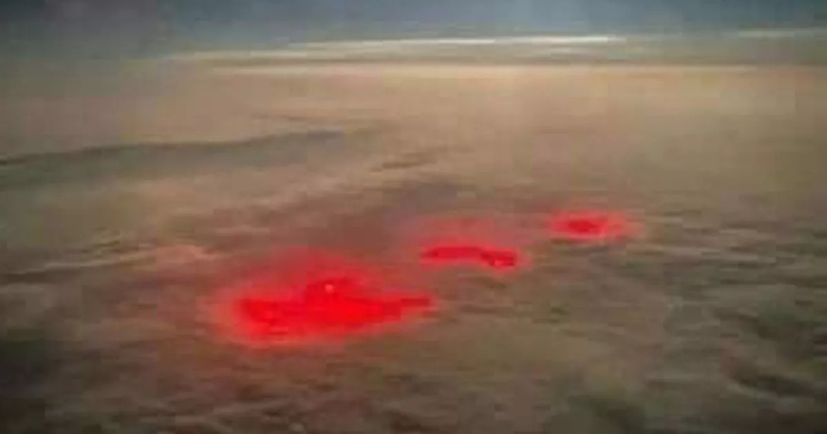 Mysterious Red Glow Illuminates Atlantic Sky: A Sci-Fi Scene or Natural Phenomenon?